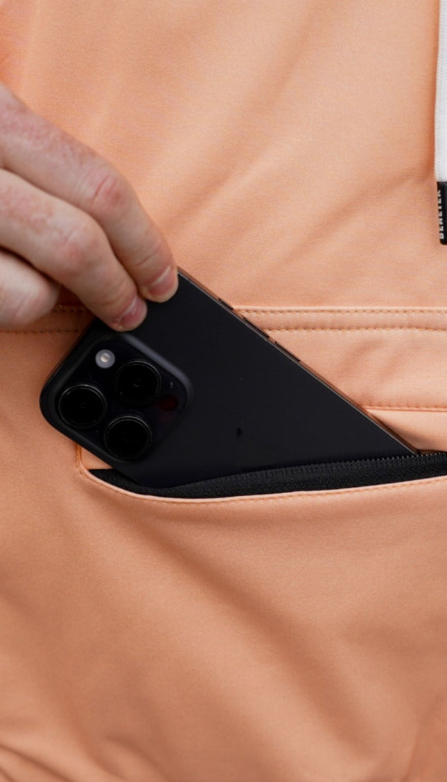 FAM WATERPROOF RIDING HOODIE: BRIGHT PEACH