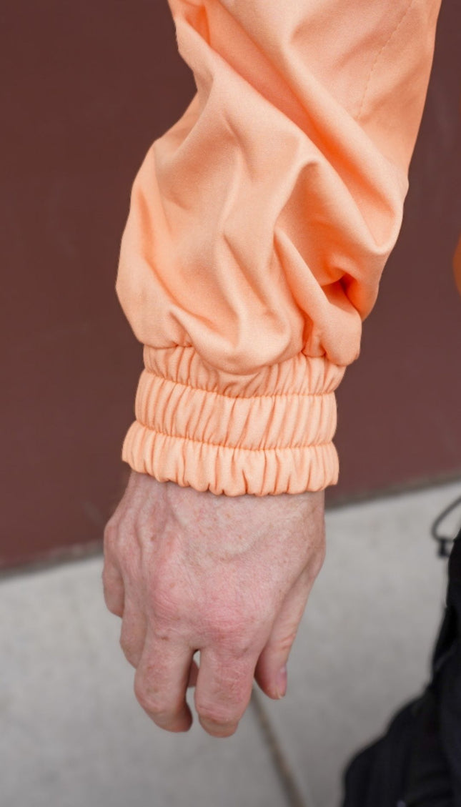 FAM WATERPROOF RIDING HOODIE: BRIGHT PEACH