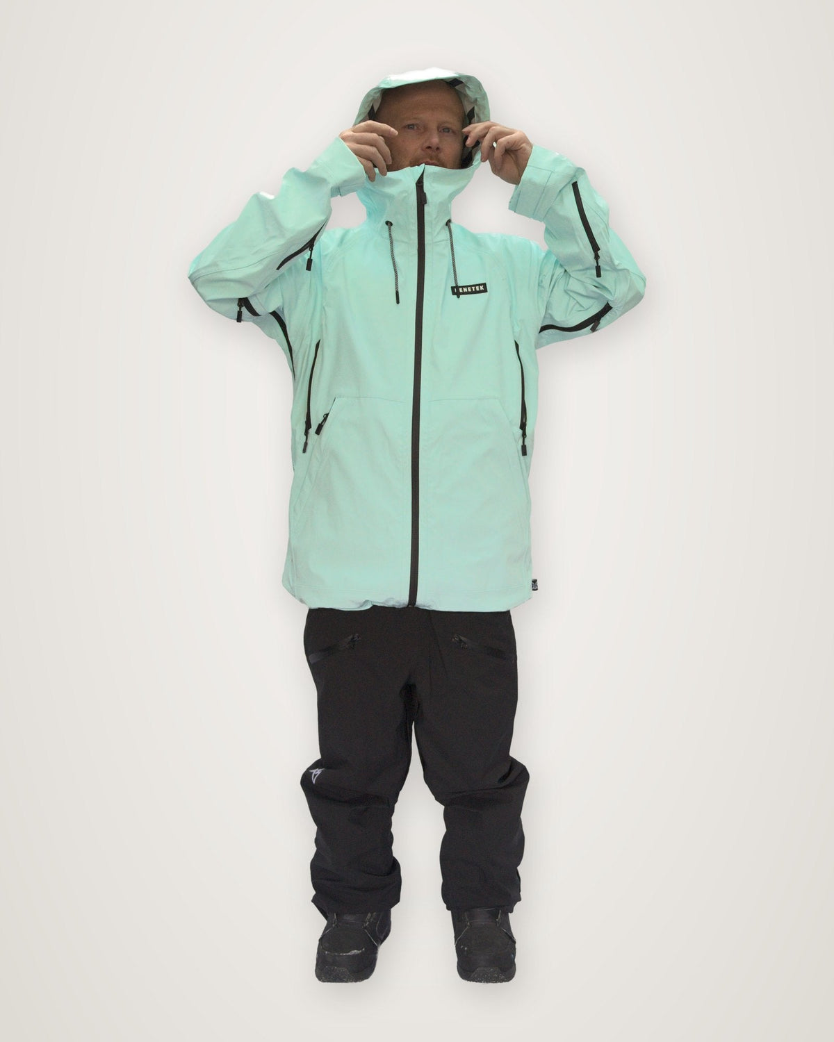 Mint Focus Jacket with the hood up