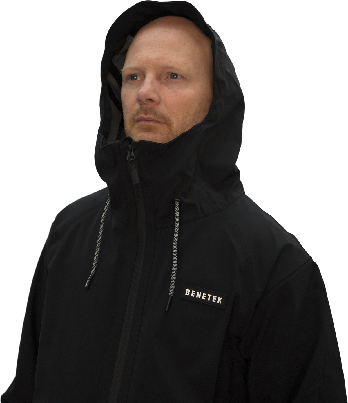 Tommie in the black Focus Jacket, hood up